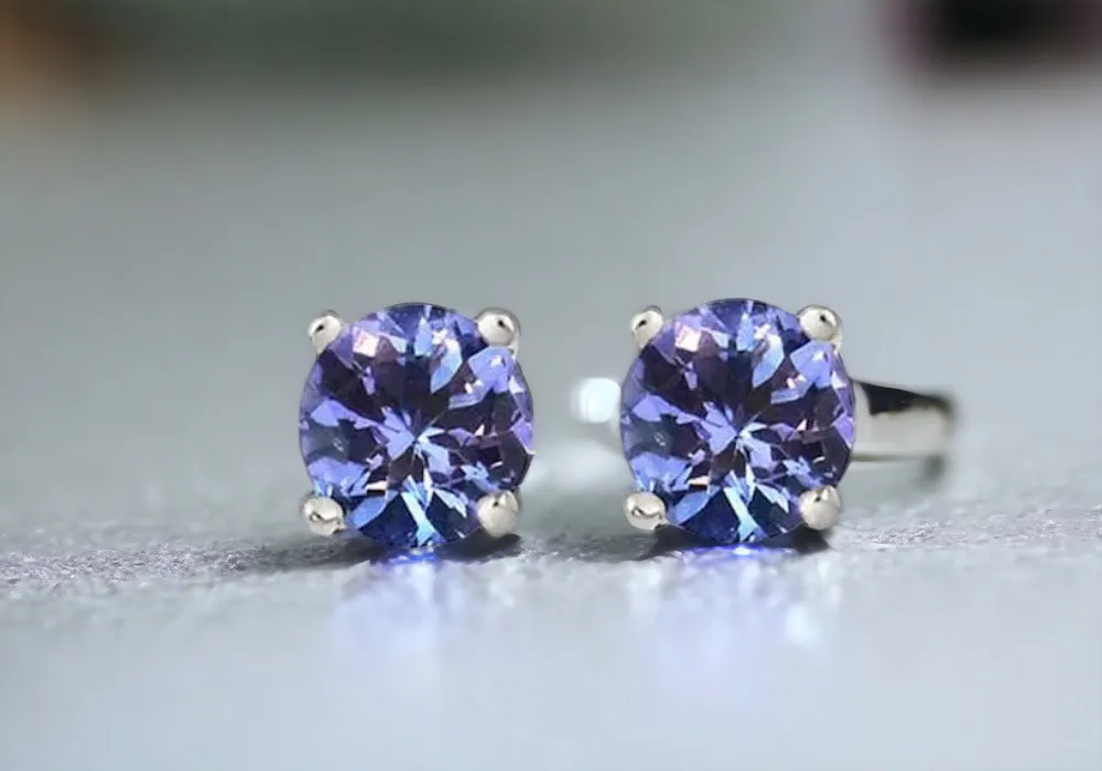 A pair of exquisite tanzanite stud earrings featuring stunning tanzanite stones.