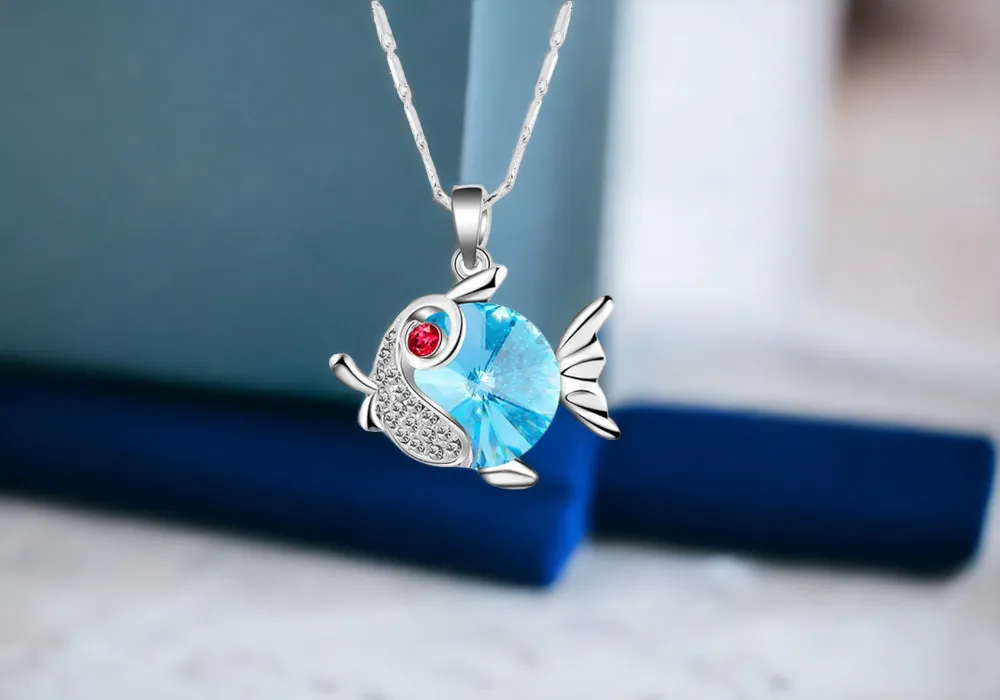 Swarovski crystal fish pendant necklace.