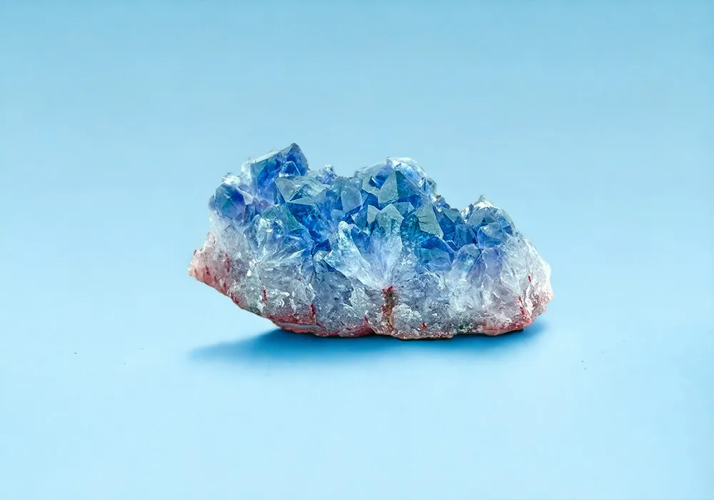 A blue crystal on a blue background.